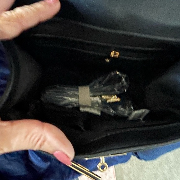 Badgley Mischka
Suede/shearling trim crossbody satchel - Picture 5 of 7